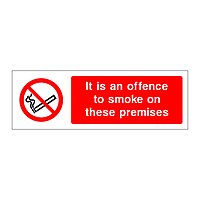 It is an offence to smoke on these premises sign