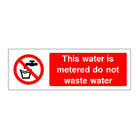 This water is metered do not waste water sign