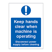 Keep hands clear when machine is operating sign