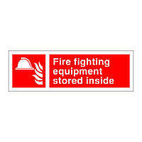 Fire fighting equipment stored inside sign