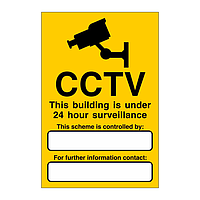 CCTV This building is under 24 hour surveillance sign