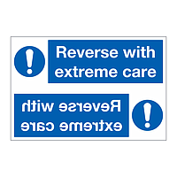 Reverse with extreme care sign