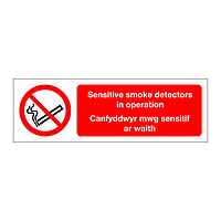 Sensitive smoke detectors in operation English/Welsh sign