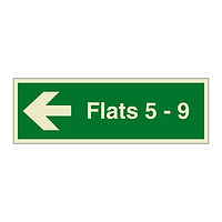 Flats 5 - 9 arrow left sign