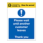 Please wait until another customer leaves Covid-19 sign