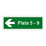 Flats 5 - 9 arrow left sign