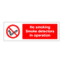 No smoking smoke detectors in operation sign