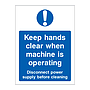 Keep hands clear when machine is operating sign