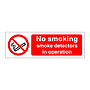 No smoking smoke detectors in operation sign