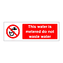 This water is metered do not waste water sign