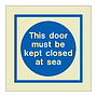 This door must be kept closed at sea (Marine Sign)