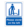 Please stand on the left sign