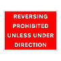 Reversing prohibited unless under direction sign