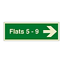 Flats 5 - 9 arrow right sign